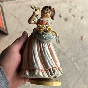 Charming Ceramic Girl Figurine with Flowers